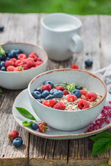 Closeup of healthy granola with fruits for breakfast