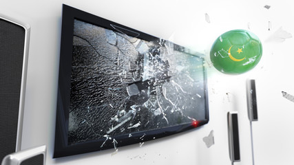 Soccer ball with the flag of Mauritania kicked through a shattering tv screen.(3D rendering series)