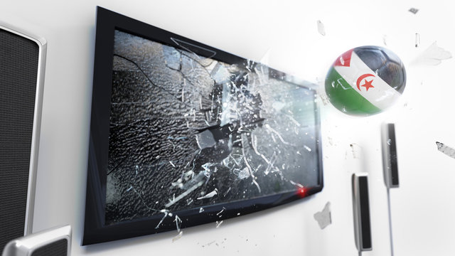 Soccer ball with the flag of Western Sahara kicked through a shattering tv screen.(3D rendering series)