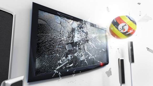 Soccer ball with the flag of Uganda kicked through a shattering tv screen.(3D rendering series)