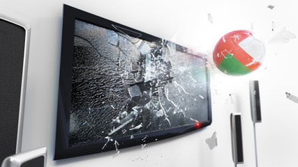 Soccer ball with the flag of Oman kicked through a shattering tv screen.(3D rendering series)
