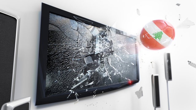 Soccer ball with the flag of Lebanon kicked through a shattering tv screen.(3D rendering series)