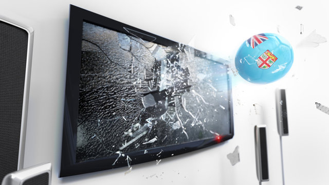 Soccer ball with the flag of Fiji kicked through a shattering tv screen.(3D rendering series)