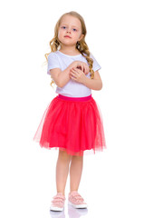 Little girl with a bouquet of tulips.