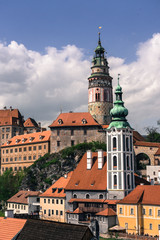 Fototapeta premium CESKY KRUMLOV, CZECH REPUBLIC - 25 APRIL, 2018: Cesky Krumlov. Castle, Tower, cityscape Cesky Krumlov, Czech republic. Sunny autumn day. UNESCO World Heritage Site.