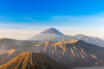 Fototapeta premium Mount Bromo volcano (Gunung Bromo) during colorful sunrise from viewpoint on Mount Penanjakan in Bromo Tengger Semeru National Park, East Java, Indonesia