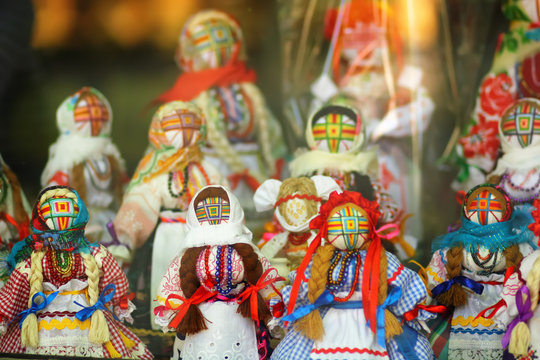 Motankas - traditional ukrainian dolls on display in toy shop window. Symbol of fertility and household guardians,they have no faces to let children develop imagination