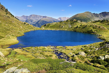 Naklejka na ściany i meble Tristaina high mountain lakes in Pyrenees. Andorra.