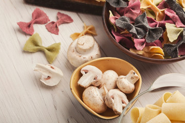 Various types of handmade pasta on white background