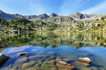 Reflection at the first lake in the circuit of Lake Pessons, Andorra