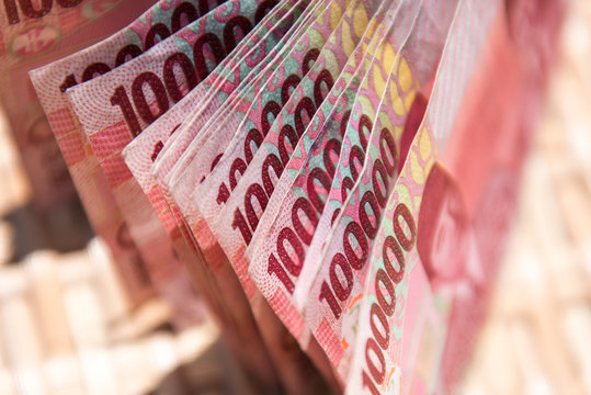Close up of Indonesian money, 100,000 IDR banknotes