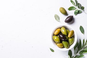 Black and green Olives  on white background.