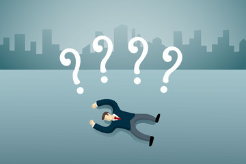 business man lie down on the floor with question mark.