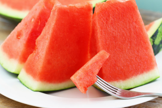 Delicious and juicy watermelon pieces, closeup
