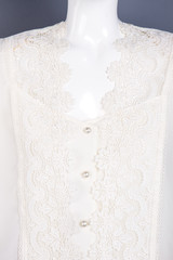 Close up beautiful women lace blouse. Female elegant clothes on mannequin. Feminine fashion and style.