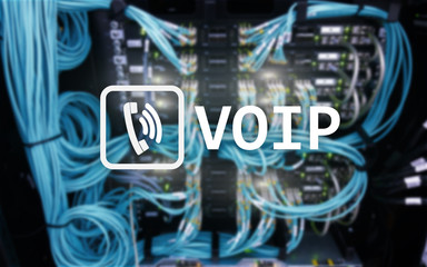 VOIP, Voice over Internet Protocol, technology that allows for speech communication via the Internet. Server room background.