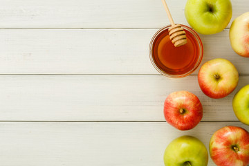 Seasonal harvest background with apples and honey