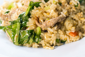 Thai food style , fried rice with pork on white background.Closed up