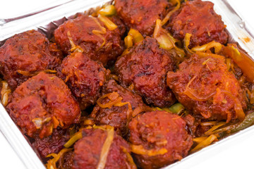 Indian Cuisine Vegetable Manchurian Also Know as Gobi Manchurian is a popular Indo Chinese Street food isolated on white background