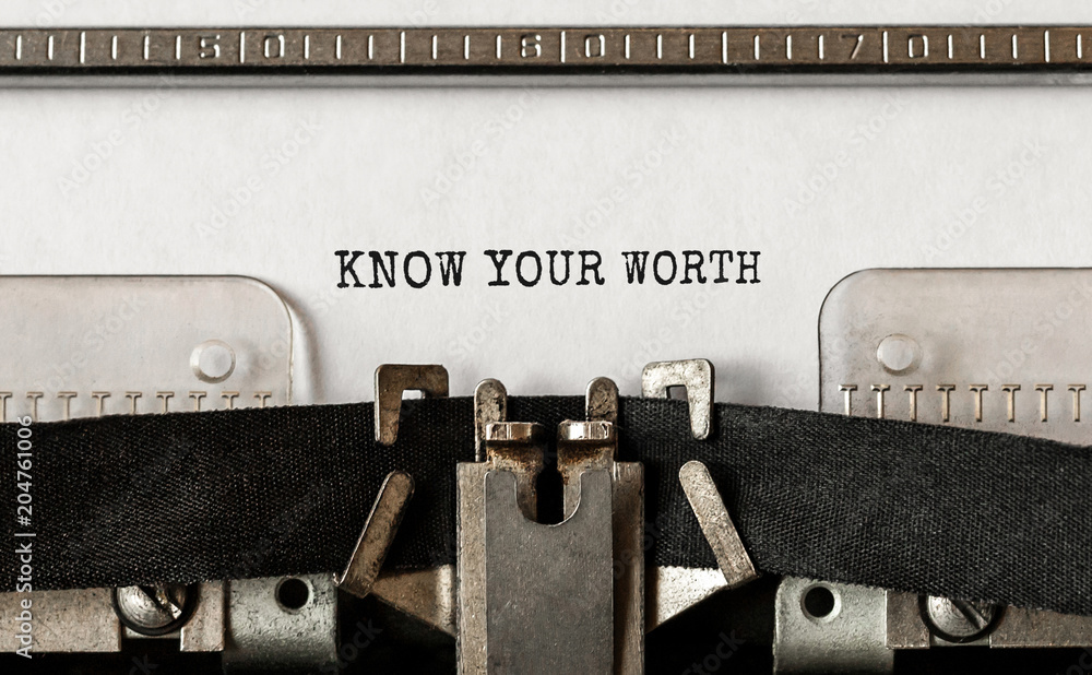 Poster text know your worth typed on retro typewriter