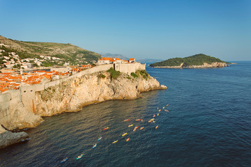 DUBROVNIK, DALMATIA, CROATIA  - 
 - View at The Old Town of Dubrovnik and Lokrum Island from Fort Lovrijenac at sunset