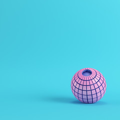 Abstract segmented pink sphere on bright blue background in pastel colors