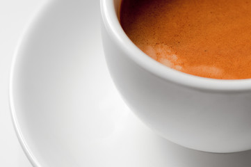 White coffee cup with espresso. Close-up, selective focus