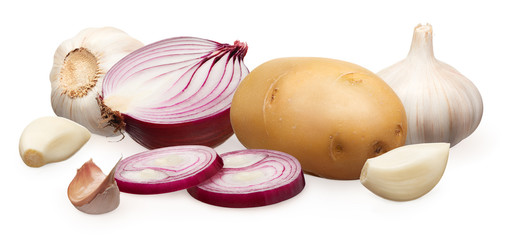 Unpeeled potato, red onion and garlic with cloves on white