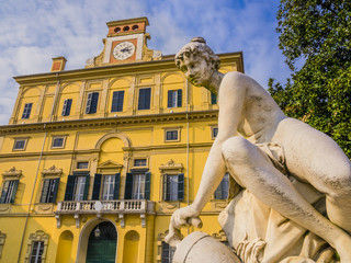 Impressive view of Ducal garden's palace with close-up of marble statue, Parma, Italy
- 204779872
