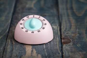 Pink Kitchen Cooking Timer on Blue Background