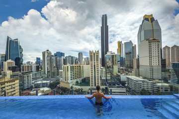 Swimming pool view of the modern skyline of Panama City ,