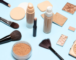 Make-up brushes and sponges with foundation makeup products