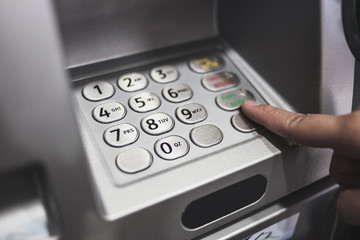 closed up of keypad of atm automatic teller machine