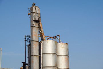 old rustic iron silo at old industrial farm