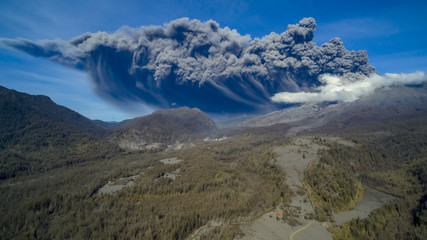 Calbuco volcano erupting, with a huge cloud of ash coming out of the crater. photo taken at Ensenada, southern Chile