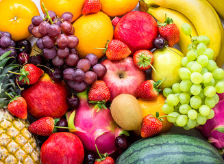 Naklejka na ściany i meble Fresh fruits.Assorted fruits colorful,clean eating,Fruit background