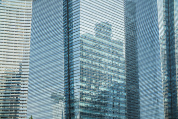 close-up of window walls skyscrapers background