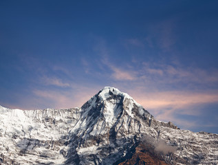 Mountain peak in Annapurna massif at sunset in Nepal Himalaya