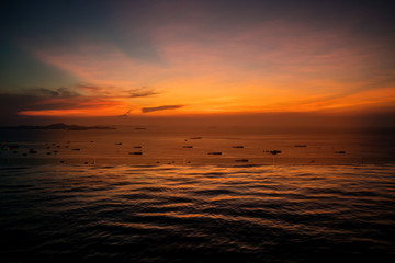 beautiful sunset at the beach and swimming pool