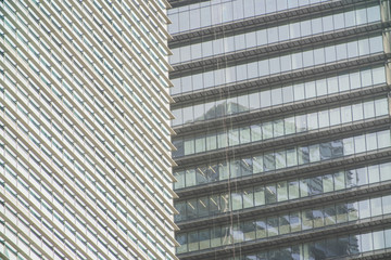 close-up of window walls skyscrapers background