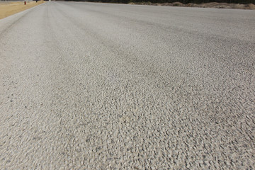 paved surface of a new unused highway