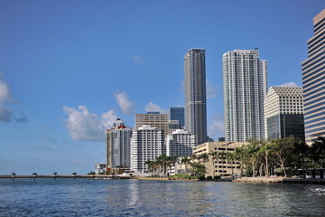 Fototapeta na wymiar Florida. Miami. Beautiful high-rise buildings on the shore in a bright sunny day