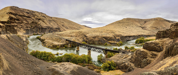 Head downriver from Maupin, Oregon, keep going below Shearars Falls until the road turns to gravel.