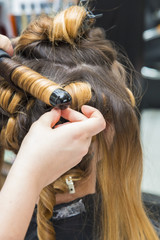 Fototapeta premium coiffeur/fer à friser