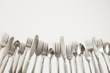 A group of flatware on white background