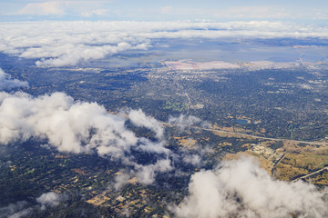 Obraz premium Aerial view of the Bedwell Bayfront Park, wetland and cityscape