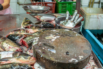 Heap of colorful fresh fish heads at the Singapore wet market in China Town - 2