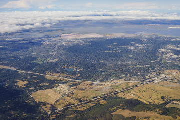 Aerial view of the Bedwell Bayfront Park, wetland and cityscape