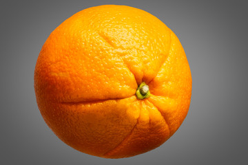 Fresh delicious single orange fruit isolated on grey background with clipping path