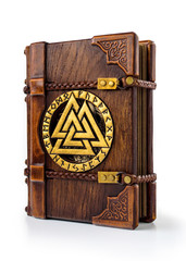 Vintage Viking book with oak wooden cover and runes arranged around central Odin's symbol. English...